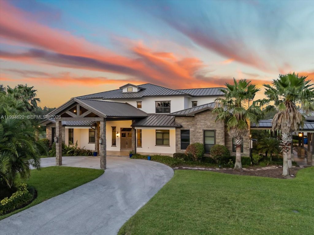 Photo of 16675 C 24 Canal Rd, Port St Lucie, FL 34987 (MLS # A11994620)