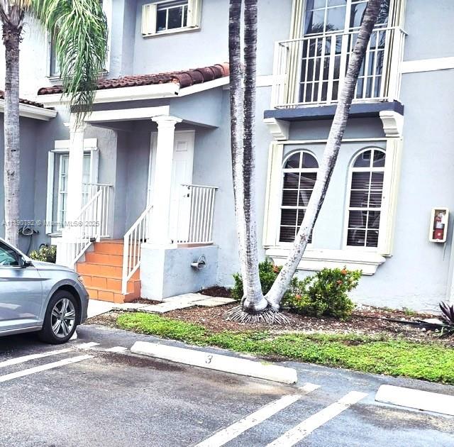 Great townhouse located at Veranda at Doral. 2 bedrooms with 2 baths inside each bedroom, and 1/2 bath on first floor. Perfect location, near very good schools, parks and highways. Complex fenced. Two assigned parking spaces in front of unit. Must see to appreciate location and comfort. Available upon HOA approval. Call LA for instructions