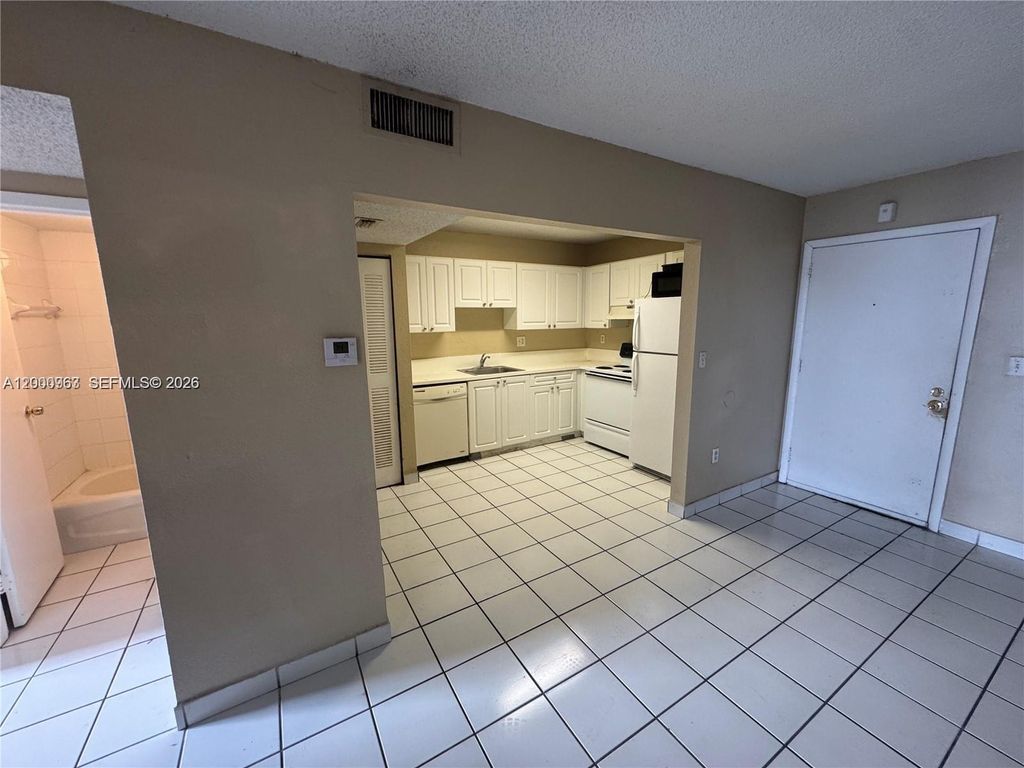 Photo of 5100 SW 41st St #PH1, Pembroke Park, FL 33023 (MLS # A12000963)