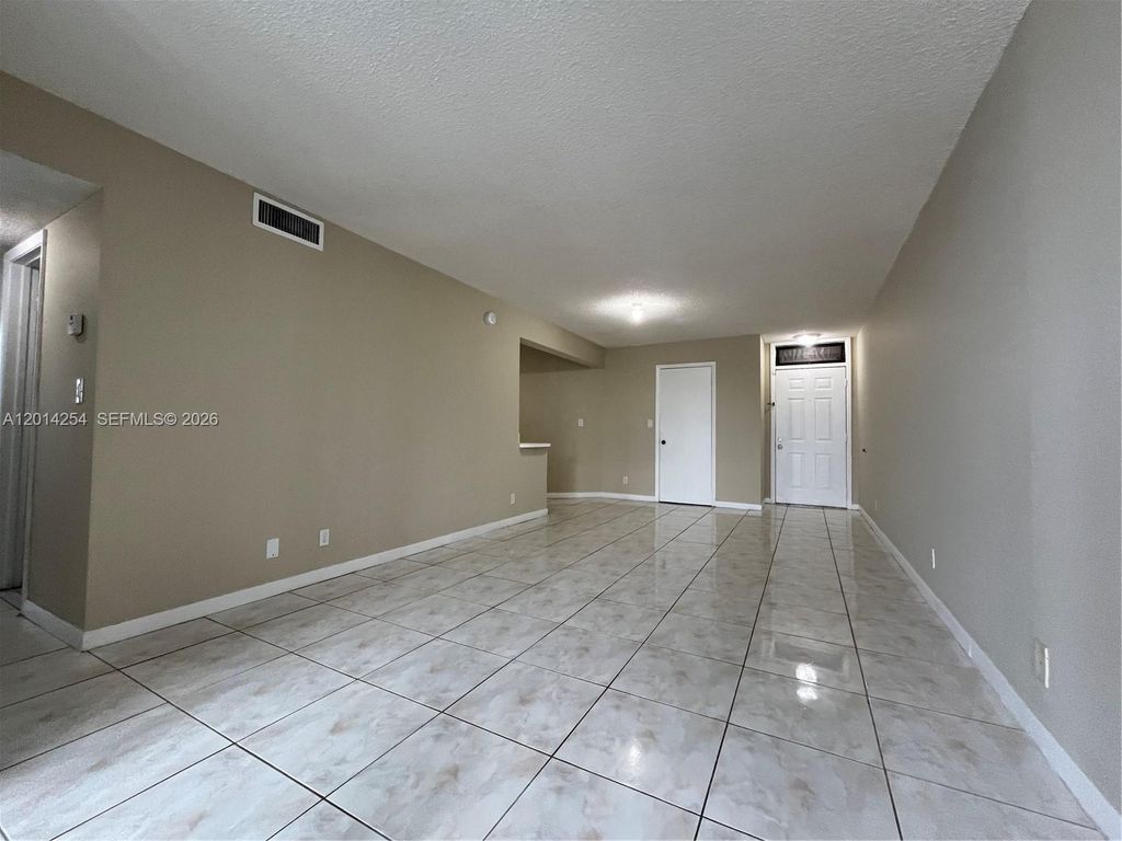 Photo of 212 Lake Pointe Dr #209, Oakland Park, FL 33309 (MLS # A12014254)