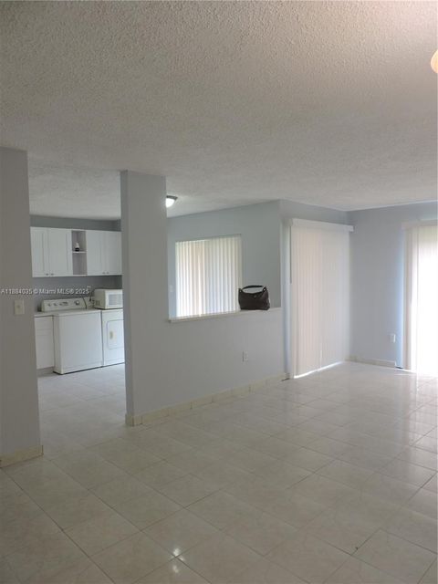 13045 SW 68 ST 104 Miami FL 33183