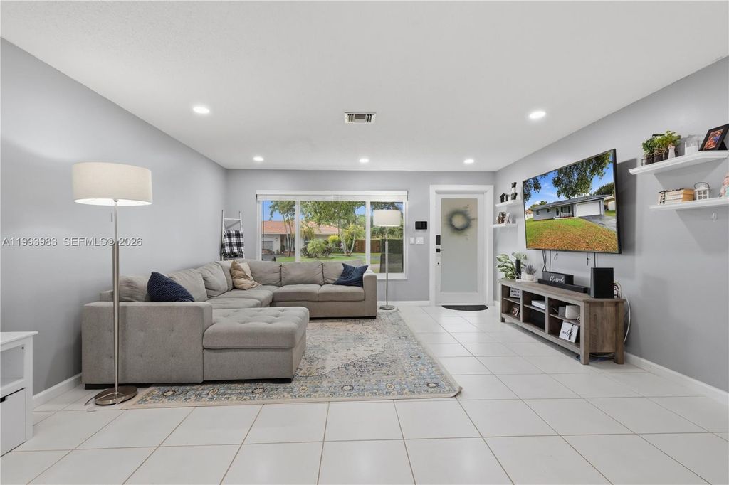 Photo of 8515 NW 26th Dr, Coral Springs, FL 33065 (MLS # A11993983)