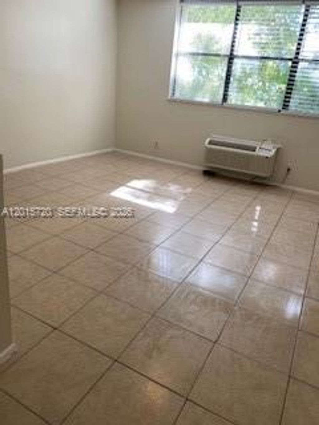 Photo of 2401 Riverside Dr #408-B, Coral Springs, FL 33065 (MLS # A12015720)