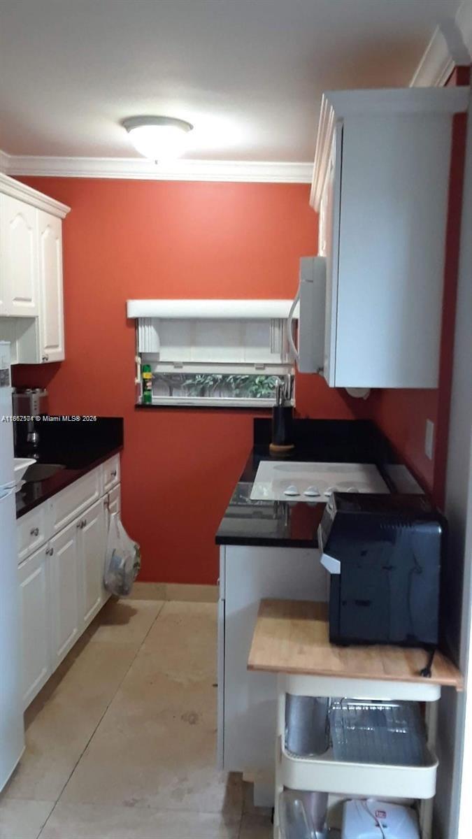 Small but cozy studio with full kitchen and private entrance for rent in Little Havana. UNFURNISHED! furniture in the pictures are from previous tenant for reference only. This unit is one block away from Calle 8 and a few blocks from Brickell. Make this beautiful studio yours. No pets. Rent + 1 security deposit only. Tenant application $50 per adult. Max 2 people. Water and electricity included.