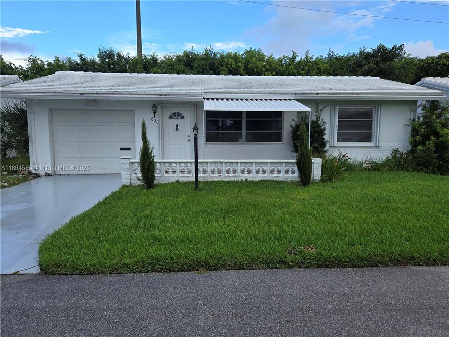Completely renovated beautiful home with spacious back views to a lagoon. This Fairmont model is two bedrooms two bathrooms with spacious closets. Both bathrooms have been remodeled with a fresh style. It also comes with accordion shutters and Hurricane rated Panel over front porch. Backyard has lots of privacy with gives access to the pond. Paid up recreation in full. Low HOAt that offers pressure washing the property every two years and painting the property every four years, landscaping, an 18 Hole Par 3 Golf course plus 3 active clubhouses with 3 heated pools with saunas and much more. Minutes to Ocean beaches, shopping and restaurants. Vacant for quick close. A Must See.