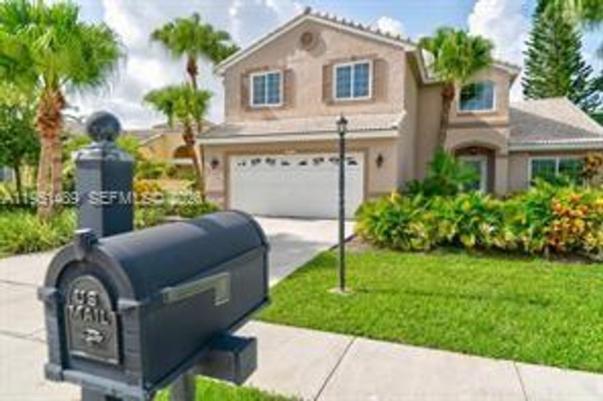 Stunning lakefront home, beautifully remodeled with a modern and welcoming design. This property offers 3 spacious bedrooms with the potential for a 4th bedroom (now used as a den),  2 full bathrooms, and 1 half bath. Enjoy the Florida lifestyle at its best with a private pool overlooking the lake—ideal for relaxing, entertaining, and family gatherings. Perfect for families. This home is located in a charming neighborhood.  Remodeled kitchen, new flooring, fresh interior and exterior paint and new roof. Enjoy a heated pool with lake views. Conveniently located near shopping, restaurants, recreational areas, major avenues and highways. Move-in ready home!