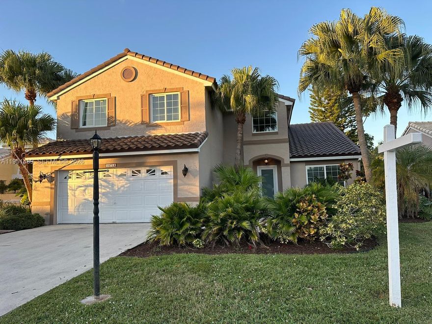 Stunning lakefront home, beautifully remodeled with a modern and welcoming design. This property offers 3 spacious bedrooms with the potential for a 4th bedroom (now used as a den),  2 full bathrooms, and 1 half bath. Enjoy the Florida lifestyle at its best with a private pool overlooking the lake—ideal for relaxing, entertaining, and family gatherings. Perfect for families. This home is located in a charming neighborhood.  Remodeled kitchen, new flooring, fresh interior and exterior paint and new roof. Enjoy a heated pool with lake views. Conveniently located near shopping, restaurants, recreational areas, major avenues and highways. Move-in ready home!