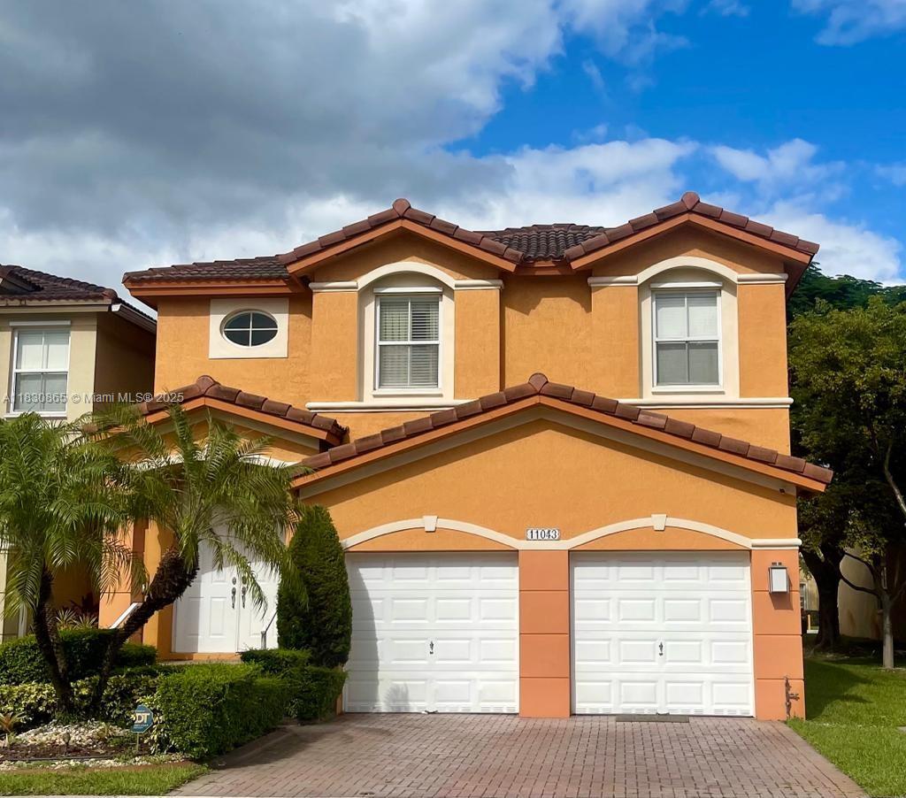 Immaculately upgraded 4-bedroom, 2.5-bathroom corner house available fully furnished. Features include a spacious 2-car garage and driveway, perfect for families or those who appreciate ample parking space. Located within walking distance to the Island at Doral clubhouse and the picturesque Doral Legacy Park, as well as top-rated K-8 schools and high schools. Enjoy convenient access to nearby amenities such as Publix, CVS, and the vibrant dining scene at Midtown Doral. This home boasts modern upgrades, including marble floors, renovated bathrooms and Italian kitchen with wine cooler and two fridge, also offers a comfortable living experience in a desirable neighborhood with numerous amenities and attractions nearby.