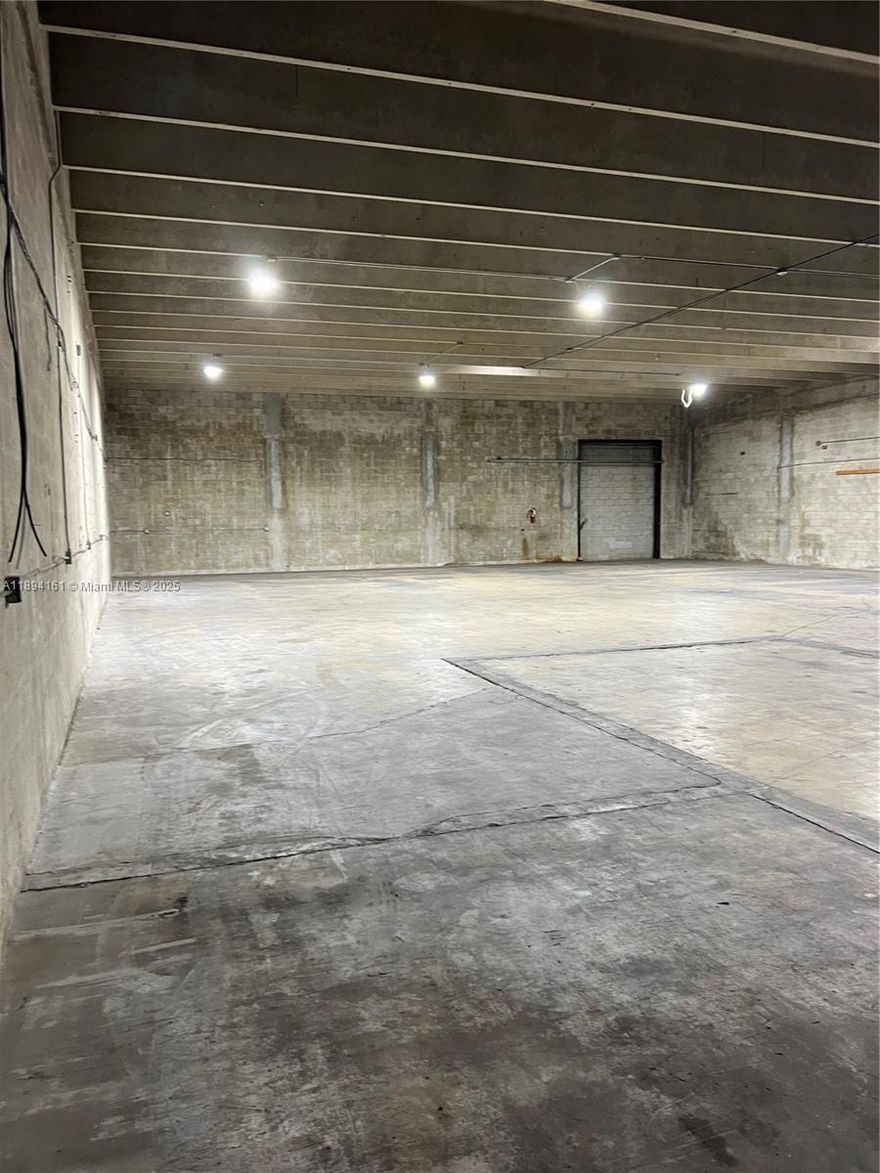 Warehouse has approximately 5,000 sf and 1,000 sf of showroom/offices for a total of ~6,000 sf. 2 bathrooms (1 in the office area and 1 in the warehouse area. Two street level front loading O/H doors. Less than 1 mile from NW 74th Street entrance to the Palmetto 826. One block from NW 72 Avenue. Near Airport. Unincorporated Miami Dade County. East of Palmetto, East of City of Doral and just south of the Town of Medley.