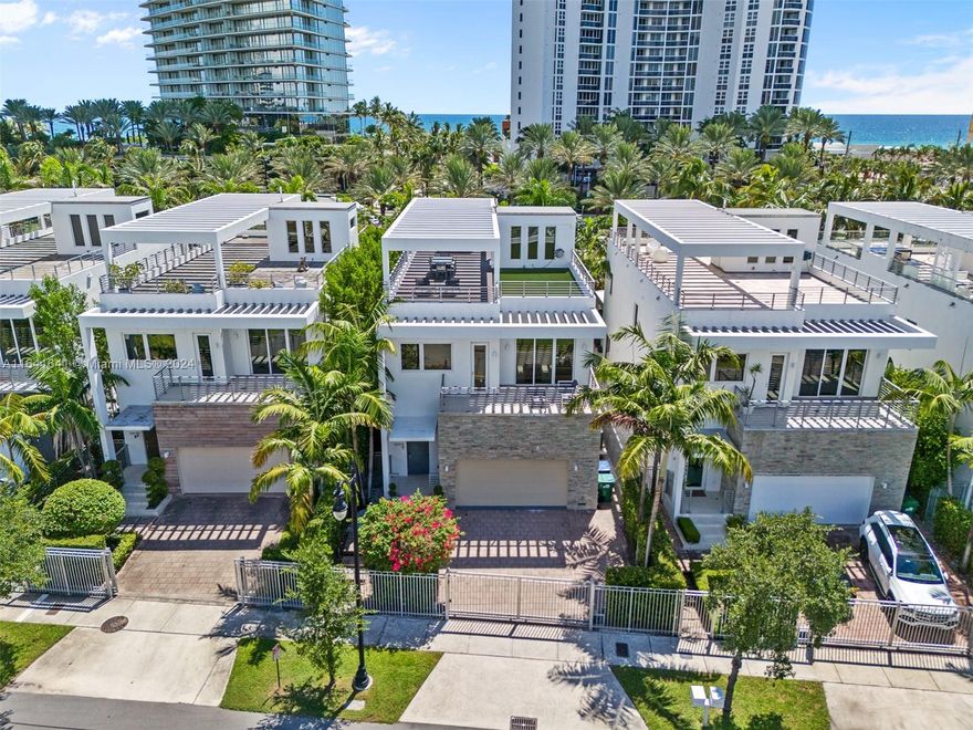 Welcome to this stunning & sophisticated, fully furnished 5B/4.5B single family residence located in the heart of Sunny Isles Beach! The home boasts incredible features, including a 1500 SF rooftop terrace with breathtaking sunset views, high-end designer furniture, Italian "Snaidero" kitchen cabinets, Viking appliances, a private movie room and California closets throughout the home in addition to 36x36 beautiful marble tile. The gorgeous two-story residence also has a resort-style backyard with a heated pool and outdoor kitchen, perfect for entertaining guests. This is a fully automated smart home (Crestron system) built in 2015 and unique to it's highly sought-after location, conveniently located within a 5-min to the beach, restaurants and nightlife. *AGENTS PLEASE SHARE 3D VIDEO TOUR*