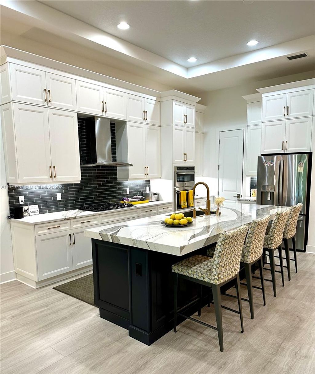 Photo of 13125 Faberge Pl, Palm Beach Gardens, FL 33418 (MLS # A11679787)