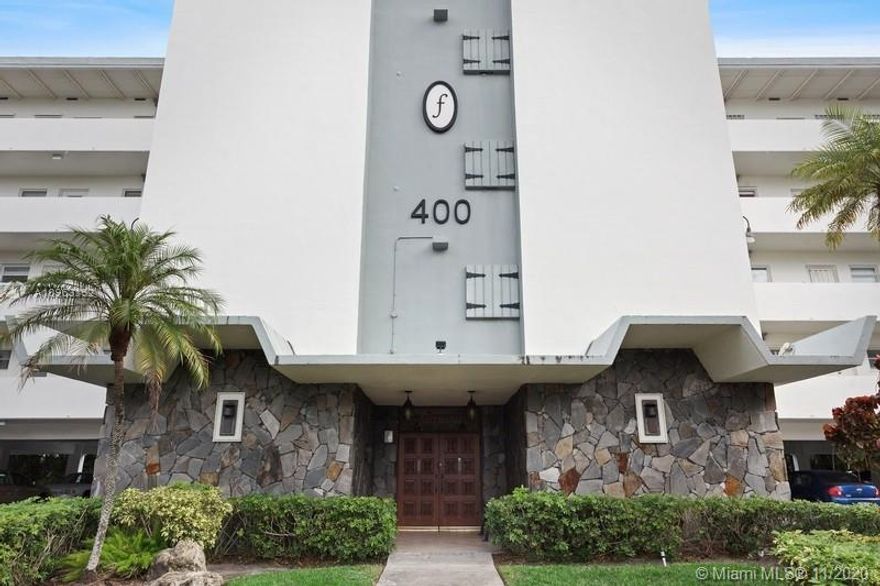 Beautiful views, top floor corner, spacious 2 bed/2 bath, in heart of Hallandale!  Enjoy the lovely breezes from your screened balcony with views of the golf course & skyline. Unit is fully tiled, with eat-in kitchen, master bedroom access to balcony. 55+ building, quiet, well-managed, heated pool and covered parking. Minutes to pristine beaches of Hallandale and Hollywood Beach Broadwalk. Walk or bike to shops, restaurants, grocery stores, houses of worship. Surrounded by all you need--airports, seaports, transportation, malls, hospitals. Such a super location at an affordable price!  Great for second home, or full-time Florida living!