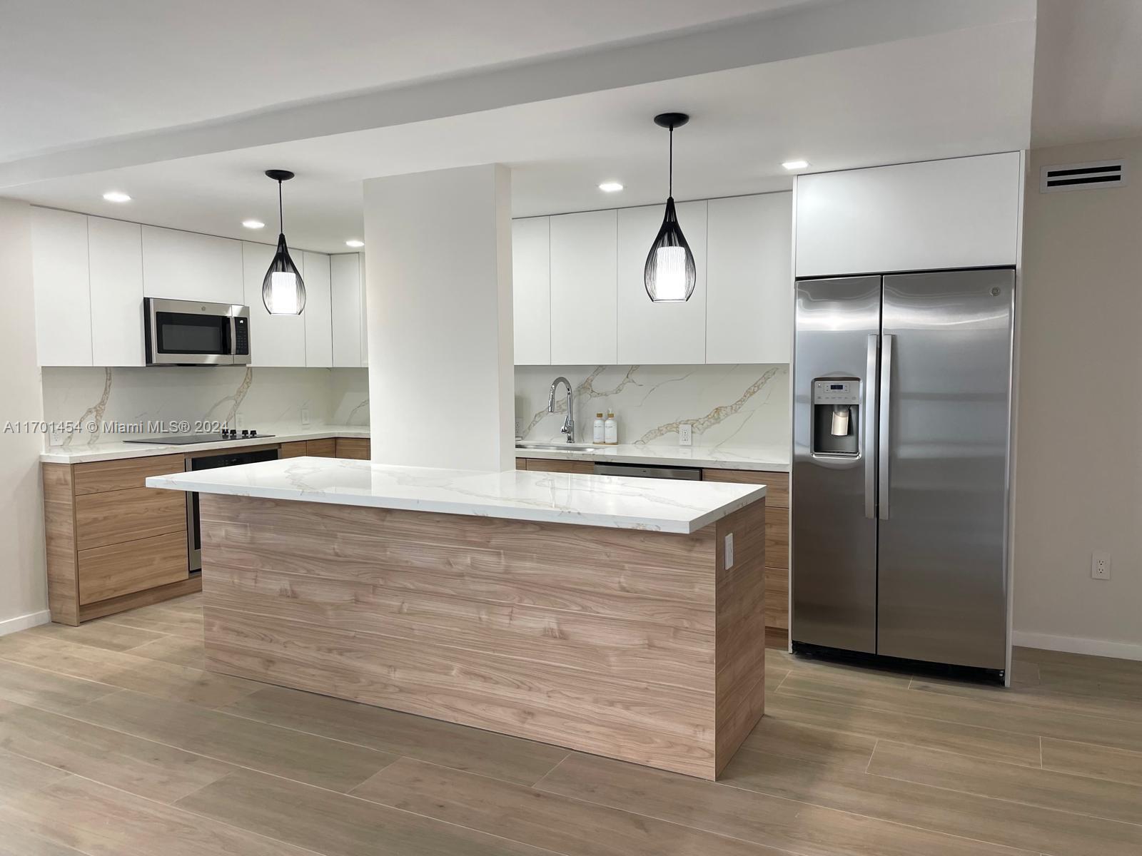 10230 Collins Ave 102