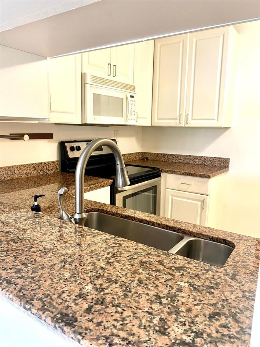 Move in ready 2/2 in Courtyards of Broward, spacious living area with balcony, master room with walk in closet, community amenities include pool, clubhouse and laundry facilities. Association approval required