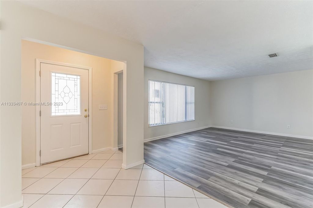 Photo of 1662 SW Carillo Ave, Port Saint Lucie, FL 34953 (MLS # A11333407)