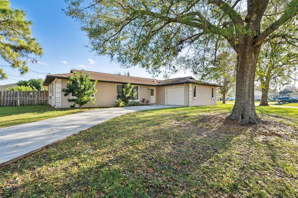 Photo of 1662 SW Carillo Ave, Port Saint Lucie, FL 34953 (MLS # A11333407)