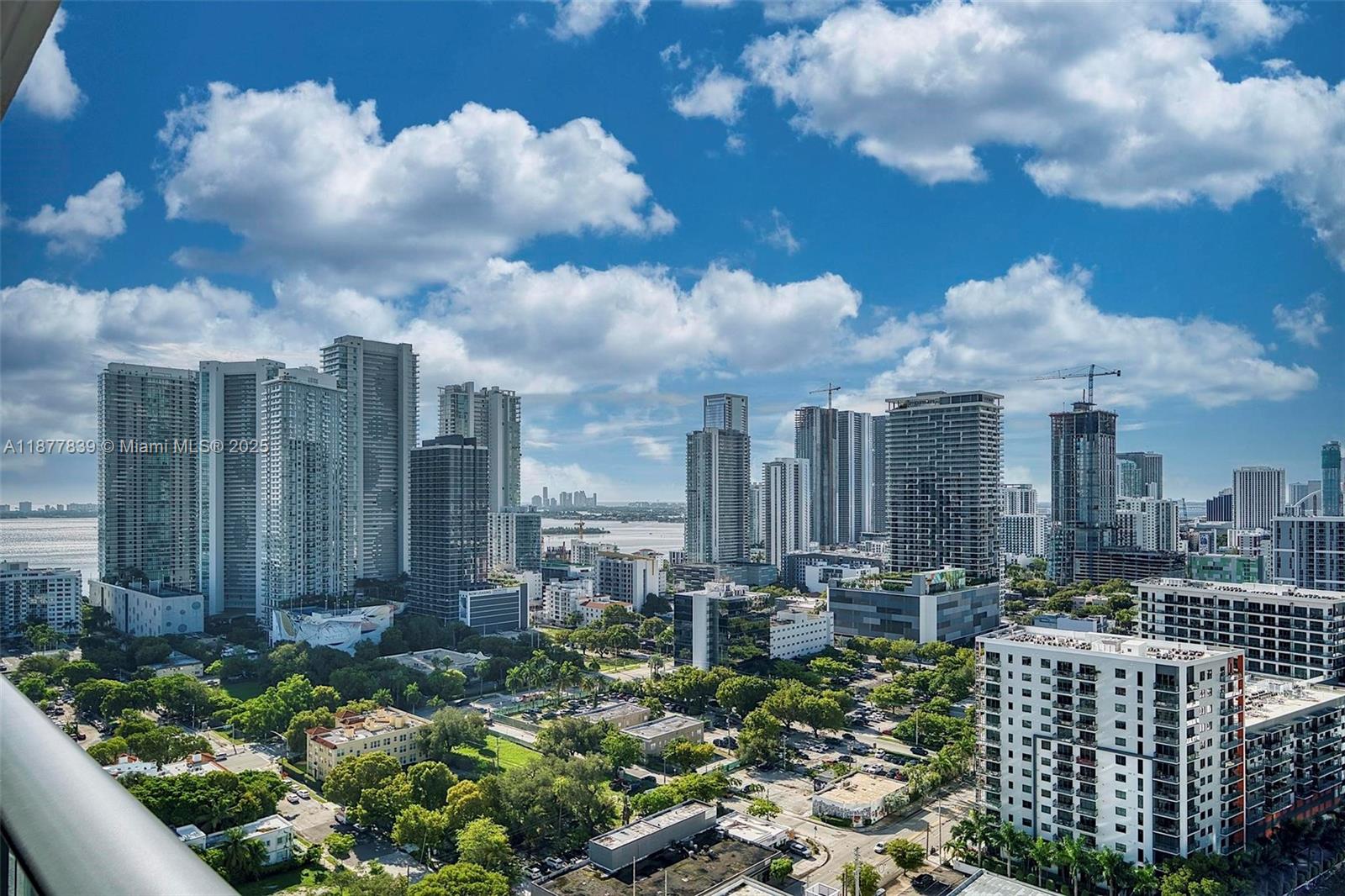 Experience modern elegance where Miami's vibrant lifestyle pulses with energy at Hyde Midtown. This turnkey, tastefully furnished 2-bed, 2-bath + Den split-floor plan residence is in the heart of Midtown Miami, buzzing with dynamic energy, nightlife, great shopping, plus cool restaurants, and cafes. Relax on the spacious balcony accessible from every room and enjoy stunning views of Biscayne Bay and the skyline. Hyde Midtown offers luxe amenities including heated pool, jacuzzi, gym, tennis court, game, children, and media rooms, plus 24/7 front desk attendant. This residence is the perfect blend of luxury and convenience and includes one parking space, cable TV, and high-speed Wi-Fi. Tenant is responsible for electricity.