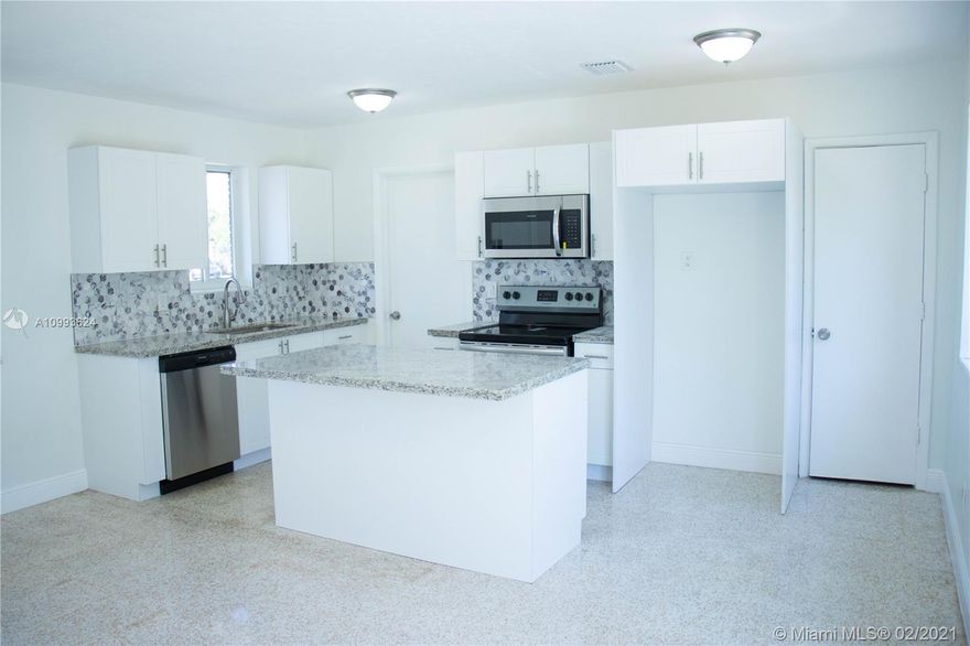 Completely renovated move in ready home. This home features brand new windows, new central air system, new custom kitchen with granite countertops and a sit-in island, brand new stainless-steel appliances ( all will be delivered before closing), refinished terrazzo flooring throughout, updated restrooms, newly painted interior & exterior, freshly manicured lawn, and a huge backyard that would be great for entertaining family and friends. This home is centrally located near shopping centers, and major highways.