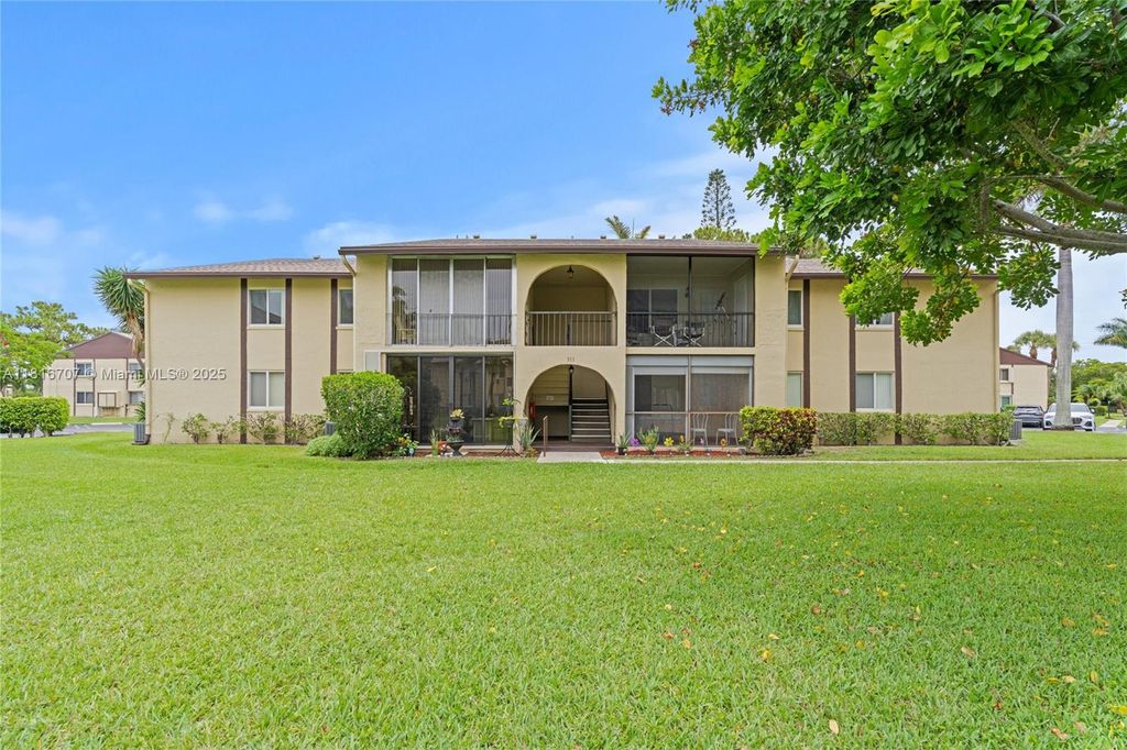 Photo of 311 Pine Ridge Cir #C-2, Green Acres, FL 33463 (MLS # A11816707)