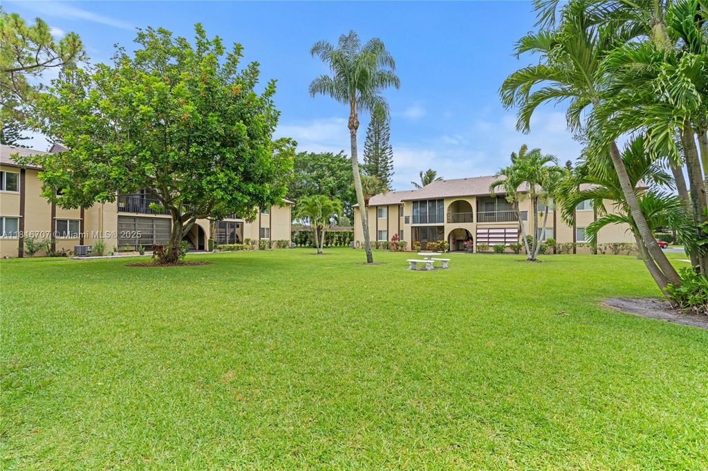 Photo of 311 Pine Ridge Cir #C-2, Green Acres, FL 33463 (MLS # A11816707)