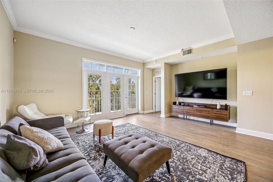 Fully furnished 3-bedroom, 2.5-bath residence in the highly sought-after Artisan Park community of Celebration, offering a bright and inviting layout filled with natural light.

Designed with a functional split floor plan, the spacious primary suite provides privacy and comfort, featuring a walk-in closet, dual sinks, and a relaxing garden tub. The open-concept living and dining areas flow seamlessly into the kitchen and breakfast nook, creating an ideal space for both everyday living and entertaining.

Step out onto your private balcony and enjoy peaceful water views, perfect for morning coffee or unwinding at the end of the day.

Additional features include one covered parking space, a private storage unit, and a recently updated air conditioning system for added comfort and peace of mind.

Located just a short walk to the Artisan Park Clubhouse and minutes from Celebration’s scenic walking and biking trails. Residents enjoy resort-style amenities including a pool, fitness center, spa, and more.