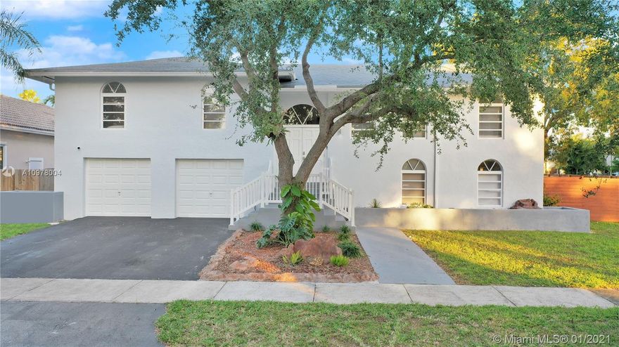 Gorgeous and spacious two-story family home sitting on a great corner lot, where you can build your own pool or have fun in a fully fenced backyard and a covered terrace. Located just one block away from the Saga Lake, perfect for outdoor activities. Completely renovated in 2018, featuring a stunning & modern open-space kitchen with quartz countertops, fully equipped with SS appliances and recessed lighting, porcelain floors in day-time area and wood floors on all rooms.  Three bedrooms and 2 full bathrooms on the 2nd floor, along with a family room with a unique balcony and a very convenient laundry room under A/C. On the 1st floor, there is a 2-car garage and an impressive 800 sq.ft. den that can be converted (ideal for in-laws). Easy to access and great schools nearby.