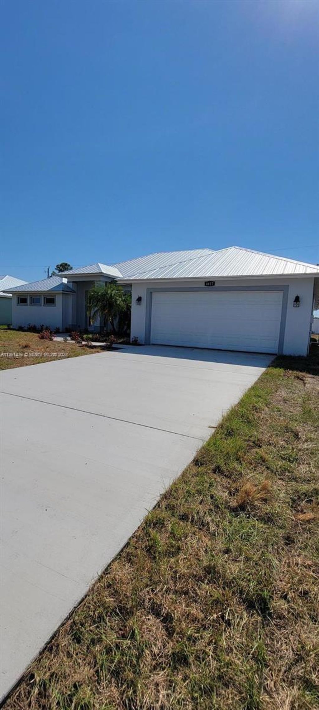 Photo of 4617 SW Savona Blvd, Port Saint Lucie, FL 34953 (MLS # A11361476)