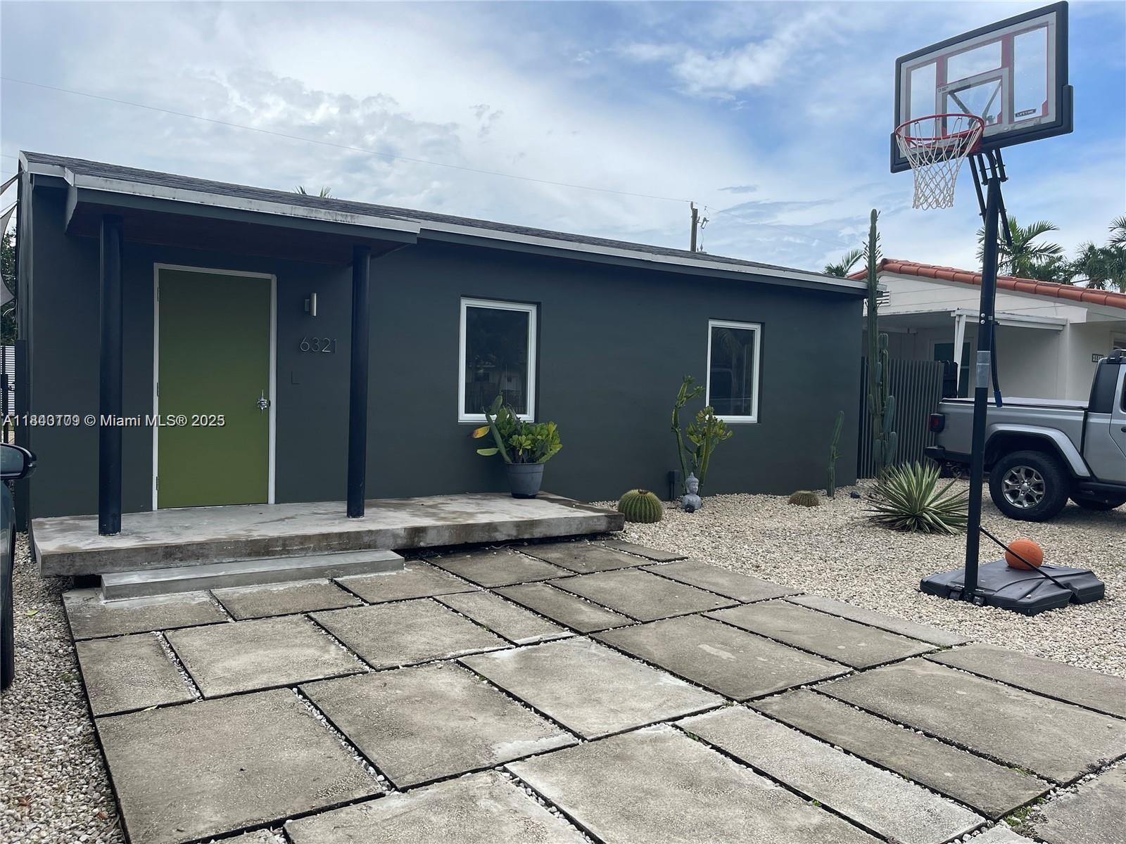 Nestled in a quiet, established neighborhood of South Miami, this charming 2-bedroom, 1-bathroom home sits on a 5,100 sq ft lot. It features an open living and dining area with polished cement floors throughout, an updated bathroom, and a spacious laundry room with a large pantry off the kitchen for added storage. Hurricane impact windows provide peace of mind, while the gated front and back yards ensure privacy and security. A storage unit in the backyard adds extra functionality. Ideally located in a safe, family-friendly area, the home offers quick access to major highways, shopping centers, restaurants, and top schools—making it a central and convenient location for everything Miami has to offer.