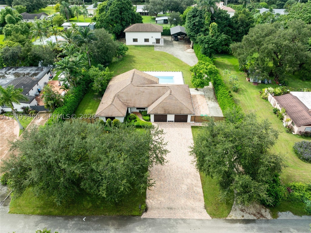 Photo of 14390 SW 24th St, Davie, FL 33325 (MLS # A12093380)