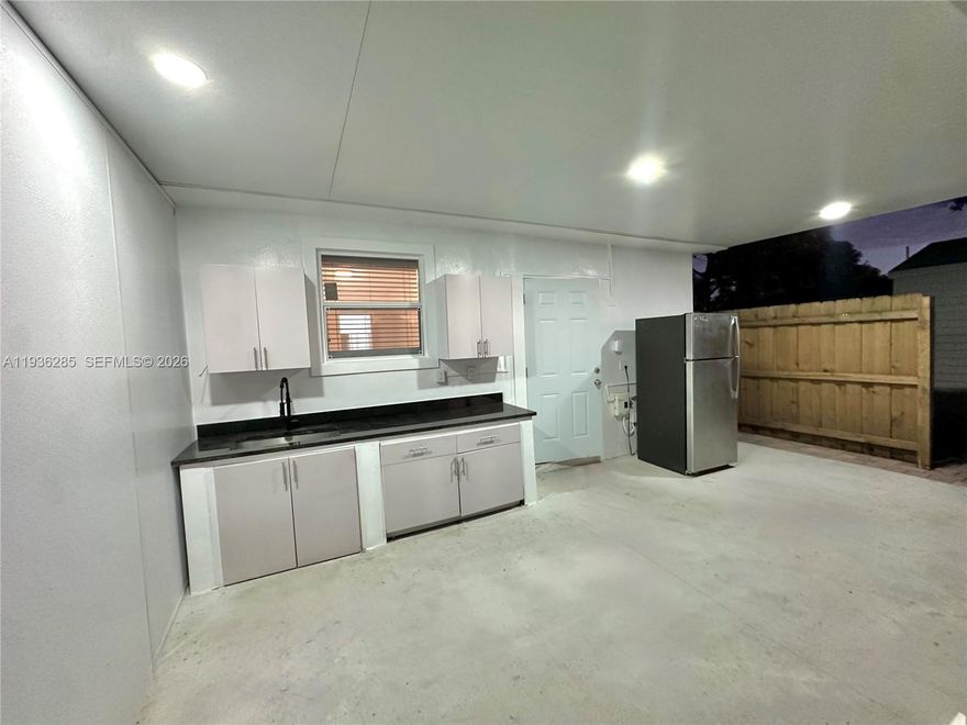 2 bedroom 1 bathroom home! The property offers a private outdoor kitchen with a stove, providing a functional and flexible living setup! Located behind a single-family home, this unit provides privacy and a quiet residential setting! Clean, bright interiors, and modern finishes make this home ideal for tenants seeking comfort and versatility. Owner will install stove prior to move in.