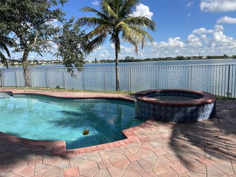 Photo of 16859 SW 16th St, Pembroke Pines, FL 33027 (MLS # A11880176)
