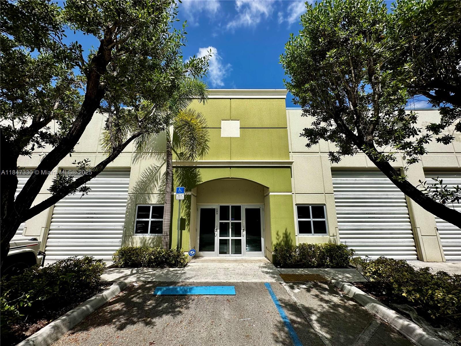 Fully air-conditioned 1,301 sq ft warehouse with 20 ft height ceiling located in Sweetwater. Conveniently located near major highways, Miami International Airport and Dolphin Mall Shopping Center. This versatile property features a spacious open warehouse area, private office space, an automatic overhead door, pallet storage racks, 2 assigned parking spaces as well as ample guest parking. This unit is ideal for light industrial, distribution, e-commerce, or creative workspace needs.