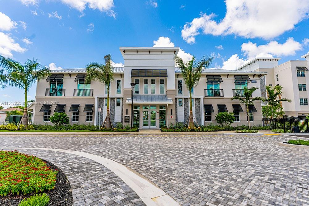 The exquisite 3/2 Clyde model is a dream home with two reserved parking spaces. Nestled in a luxury community and boasting 11-foot ceiling with impact windows and doors, every detail has been meticulously crafted, from the sleek stainless steel appliances to the full-size front-loading washer and dryer. The common areas gleam with stylish flooring and a split floor plan that offers a generous 1,485 sq ft of living space. Step outside onto the large balcony for a breath of fresh air. Take advantage of the 2-story fitness center with 24/7 access, or conduct your business in the well-equipped center, complete with computers, a smart TV, and printing capabilities. Close to major roads, top rated schools, and more, this is more than just an apartment – it's a lifestyle. Welcome home!
