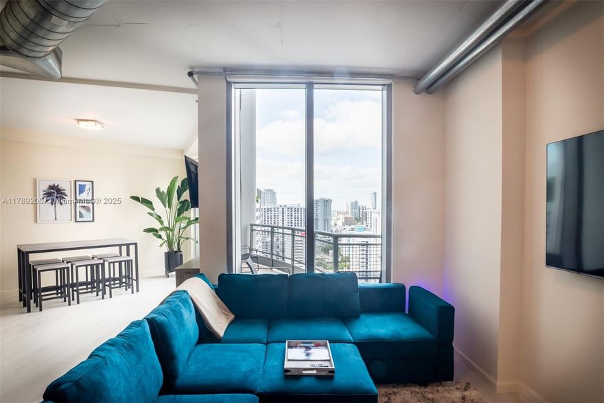 Experience urban living in this breathtaking 25th-floor residence. This two-story, fully furnished 2bed w primary  enclosed and second bedroom open w curtains for privacy includes a murphy bed | 2bath home is ideal for professionals seeking a modern lifestyle. The property boasts brand new flooring, a new washer and dryer, a new refrigerator, freshly painted and professionally cleaned. Residents enjoy access to an exceptional array of amenities including Pool, Fitness center, Golf simulator, EV charging stations, Basketball & Pickleball courts, a Billiard room, a Club room, and an on-site American Social restaurant facing the Miami River. Just steps from Brickell City Centre and Mary Brickell Village, this building is perfectly situated for those who enjoy a vibrant urban lifestyle.