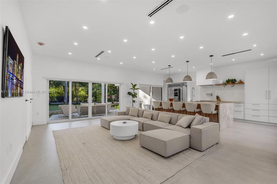 This remarkable 3 bedroom home is nestled on an expansive, landscaped lot with mature palm trees and ample green space for relaxation or entertaining. The stunning modern interiors feature a gourmet kitchen with high-end appliances, spacious open-concept living areas, and spa-like bathrooms with a steam shower and sleek finishes. Outdoors, enjoy a cold plunge and a covered patio for al fresco dining or unwind in the serene backyard. This property is ideal for those seeking privacy and a vibrant city lifestyle. Don’t miss this unique opportunity!