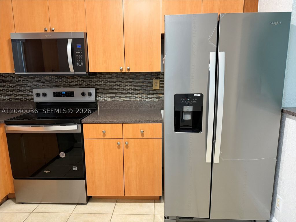 Photo of 4767 NW 9th Dr #4767, Plantation, FL 33317 (MLS # A12040036)