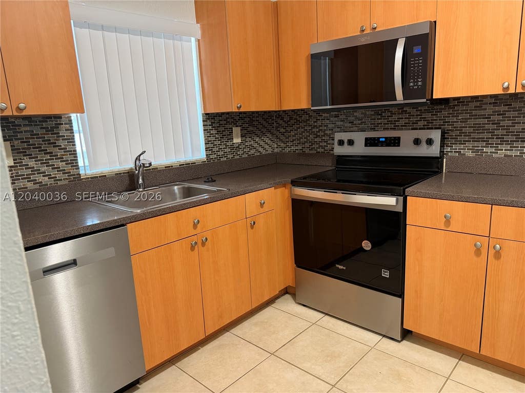 Photo of 4767 NW 9th Dr #4767, Plantation, FL 33317 (MLS # A12040036)