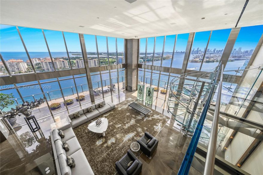 THE BEST PENTHOUSE IN THE BEST BOUTIQUE BUILDING IN MIAMI LOCATED IN THE PRIME SOUTH OF 5TH STREET NEIGHBORHOOD IN SOUTH BEACH DESIGNED BY THE AWARD-WINNING PH DESIGN GROUP WITH OCEAN, DIRECT DOWNTOWN & BAY VIEWS WITH MASSIVE PRIVATE ROOFTOP & POOL! Corner Tri-Plex Penthouse encompassing over 21,000 SF of Total Space w/ 5 Beds + 4 Full Baths + 3 Powder Rooms. Oversized Private Rooftop w/ Pool & Spa + Cabana Suite & Sauna. Fully-Equipped SS Summer Kitchen. Gaudí Marble Waterfall & Dining Area for 22 guests. Rooftop Theater w/ surround-sound system. Main level w/ soaring double-height 24' ceilings & opulent views of the Atlantic & City. Chef’s Kitchen is equipped w/ Miele Appliances. Service Kitchen & Prep Area w/ staff bath. Primary Suite w/ a Library including an integrated moving bookcase w/ a surprise entrance into the Bedroom. Primary Bath wrapped in Light American Ash Wood, Gaudí marble, laser-sculptured stone art walls + outdoor shower. Sculptural Faour glass staircase leads you to the Second Level w/ 3 Oversized Guest Suites, all w/ panoramic views + Midnight kitchen. Private interior elevator to all 3 levels. Air-Conditioned 2.5+ Car Garage w/ temperature-controlled wine storage + Valet. HUGE Dedicated Storage Space for the Penthouse. Apogee is the Epitome of Luxury & Privacy for ultra-high-net-worth individuals. Featuring a Resort-Style Pool & Poolside Cabanas, Full-Service Concierge Service, 24-Hour Valet Parking, Spa, Fitness Center & Presidential Level Security.