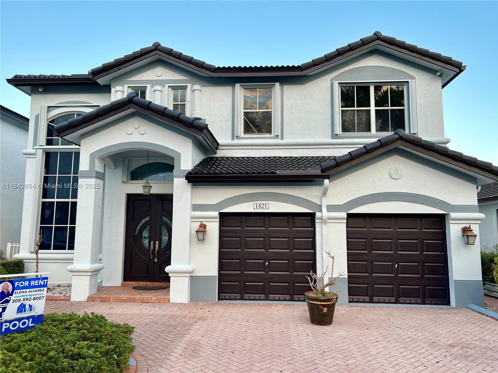 Must see! Magnificent two story lakefront and pool with jacuzzi house, 4 bedrooms 3 baths. Walk into volume ceilings, tile floors, lovely living area and a breakfast nook, granite counter top, SS appliances. One bedroom on first floor, primary bedroom upstairs with his/her closets and a balcony with breathtaking view of pool and lake. Not one but two air conditioners to reassure a cool temperature inside the house. Two car garage, washer and dryer, great patio and pool area for entertaining and much more! "A" schools and Pinecrest Glades Academy is around the corner, close to FIU and shopping centers. It has everything a family could ask for!