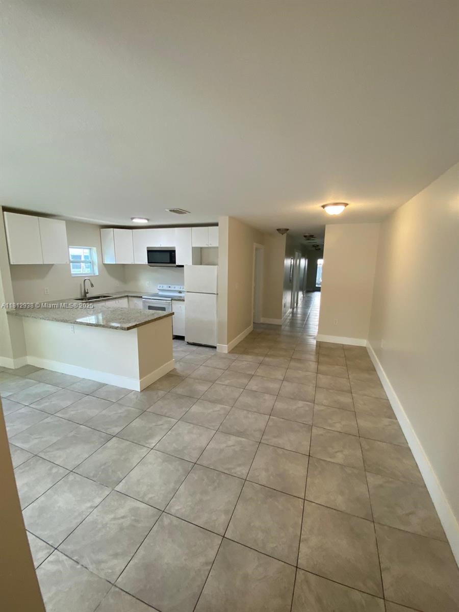 Rental Property at 5447 Nw 5th Ct, Miami, Broward County, Florida - Bedrooms: 3 
Bathrooms: 2  - $2,750 MO.