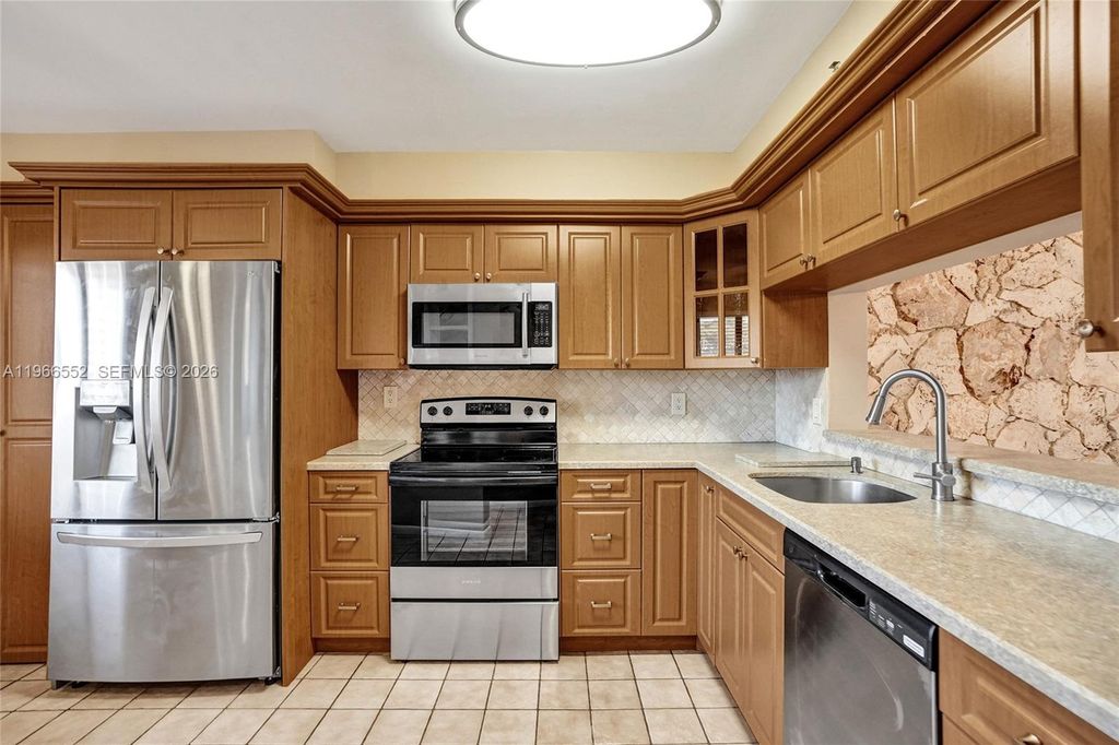 Photo of 14475 Strathmore Ln #406, Delray Beach, FL 33446 (MLS # A11966552)