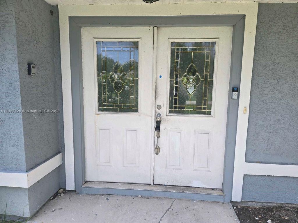 Photo of 1744 SE Berkshire Blvd, Port St Lucie, FL 34952 (MLS # A11837129)