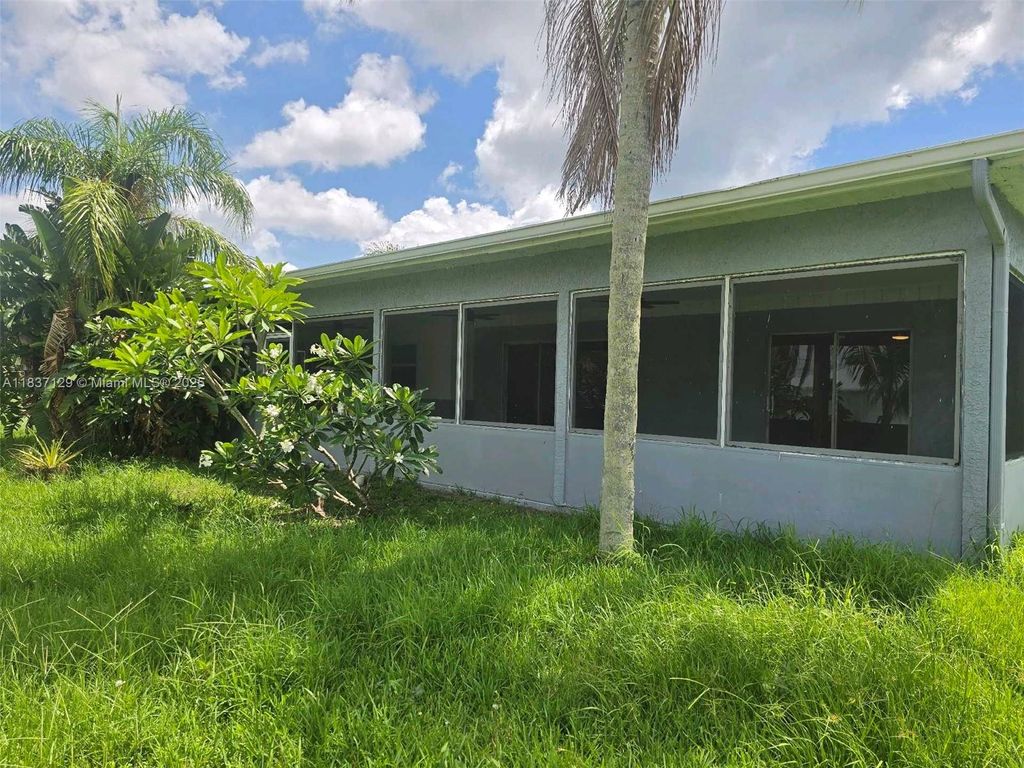 Photo of 1744 SE Berkshire Blvd, Port St Lucie, FL 34952 (MLS # A11837129)