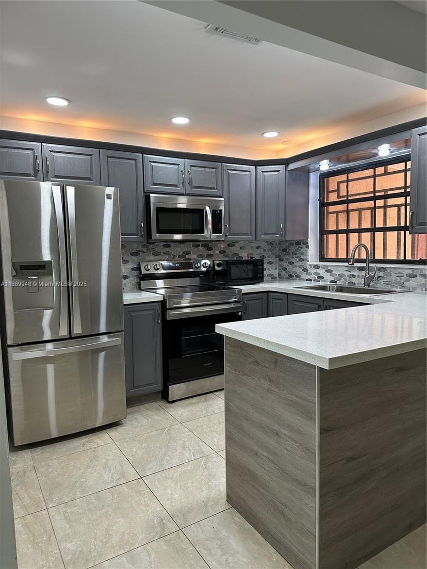 Welcome to this MOVE IN beauty in the heart of Kendall.  This property is close to amazing schools, shopping centers, restaurants and the Turnpike and other major roadways are close by. This lovely property has ceramic tile on the first floor and laminate floors on the stairs and second floor.  There are 2 assigned parking spaces directly in front of the unit and a cozy patio in the back. This complex is gated and well-maintained. There is also a washer and dryer in the unit for added convenience. Don't miss out on this opportunity and schedule a showing today.