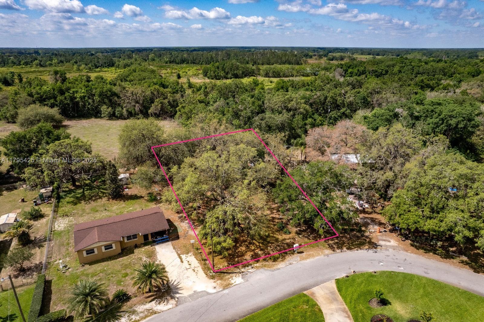 Land for Sale–2230 Maxwell Ave, Groveland, FL 34736. 0.33-acre dry buildable lot located in a peaceful residential area. Impressive 304 ft of road frontage offers excellent access & flexibility for building your dream home or placing a mobile/manufactured home. This property is free of HOA & deed restrictions, giving you the freedom to create the space that works best for you. Utilities are nearby (buyer to verify) & the land is flat & ready to develop. The neighborhood is quiet yet conveniently located just minutes from downtown Groveland, Lake David Park, schools & local shops. Easy access to SR 50 & US-27 makes commutes to Clermont, Orlando or the theme parks quick & simple. Whether you’re building now or holding as an investment this property is a solid opportunity in a growing area