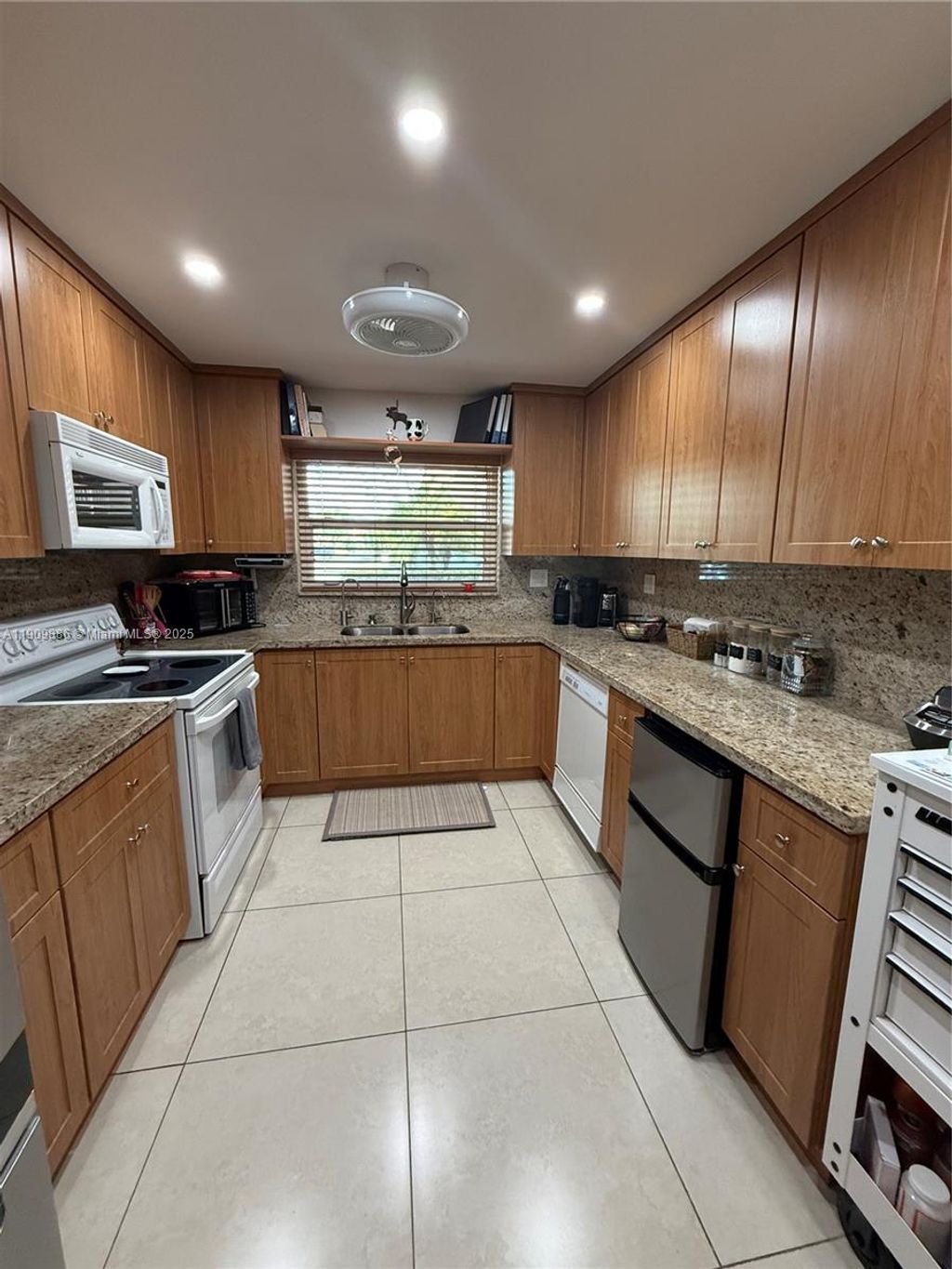 Photo of 9741 Sunrise Lakes Blvd #107, Sunrise, FL 33322 (MLS # A11909886)