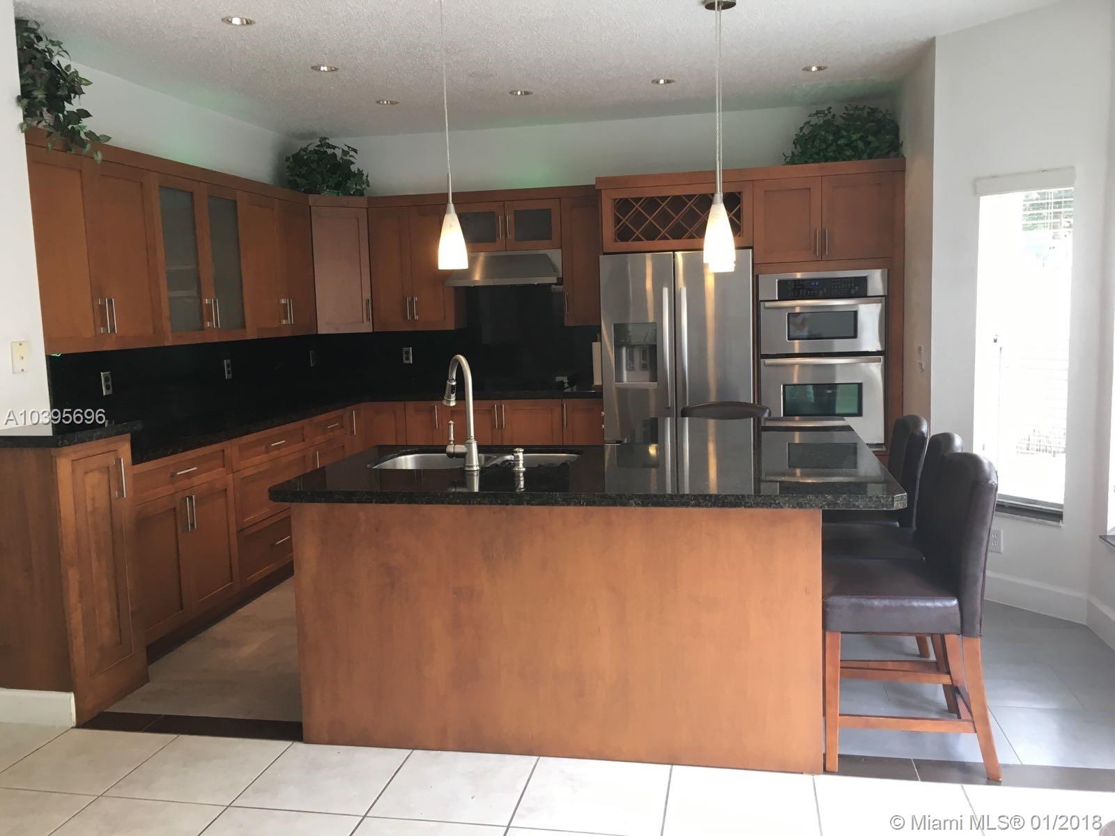 Beautiful 5 Bedroom/3 Bathroom, ONE FULL BED AND FULL BATH ON THE FIRST FLOOR, ample family room, and den area in the second floor, located in the lavish community of Doral Isles. Club House includes gym, pools, soccer, beisball, basketball and tennis courts