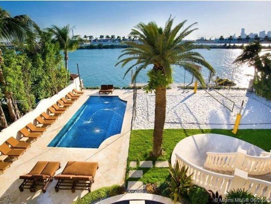 Located in the prestigious and gated Palm Island, this grand estate is a rare opportunity. The grand foyer welcomes you into the expansive living room w direct water views. Set on a 30,000 SqFt lot this 20,000 SqFt Estate includes 7 beds, 9 baths & 4 half baths. The sprawling Master Suite includes his & hers bathrooms, sitting area w fire place & a private balcony w stunning water views. A movie theater, chef's kitchen, two pools, volleyball court, 4 car garage & a private dock w 100 feet of frontage are just some of the features. Enjoy all of Palm Island's amenities including tennis & basketball courts, playground and 24 hour police security while also being minutes from the best shopping, restaurants & airports.