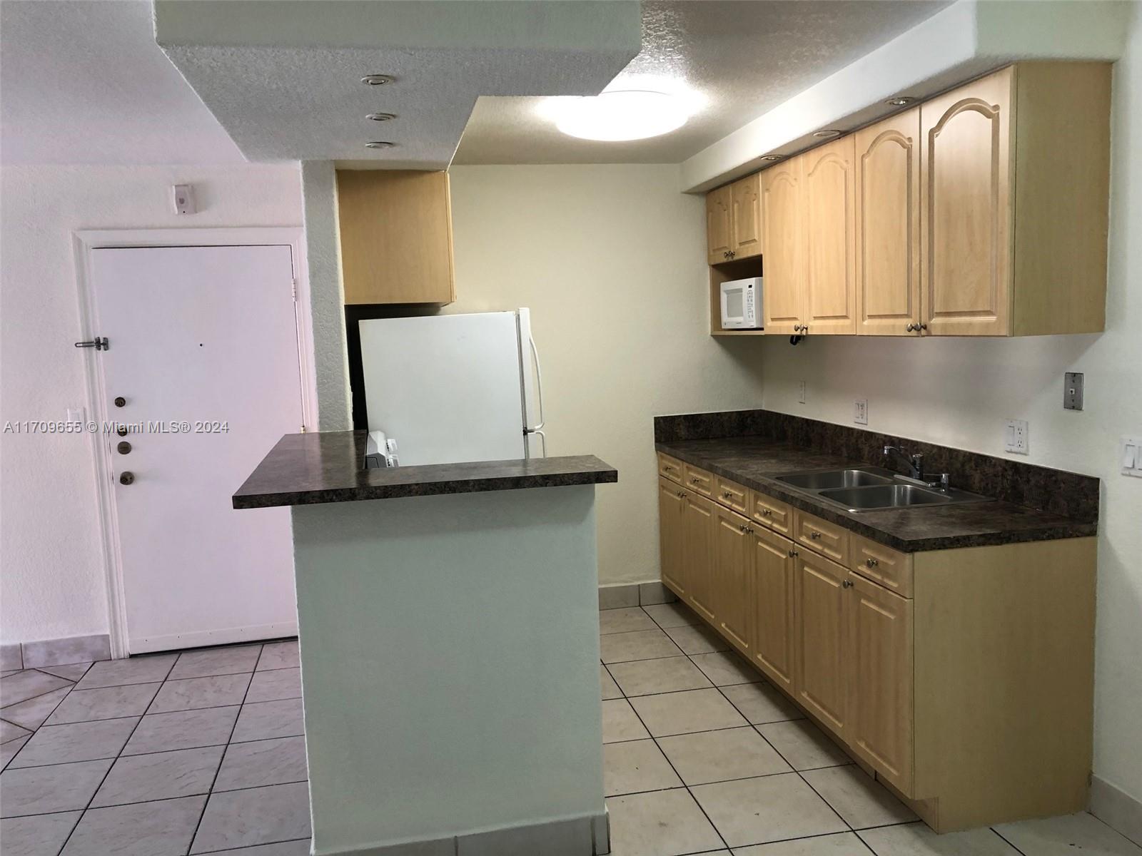 SPANISH TRACE CONDO - Residential Lease
