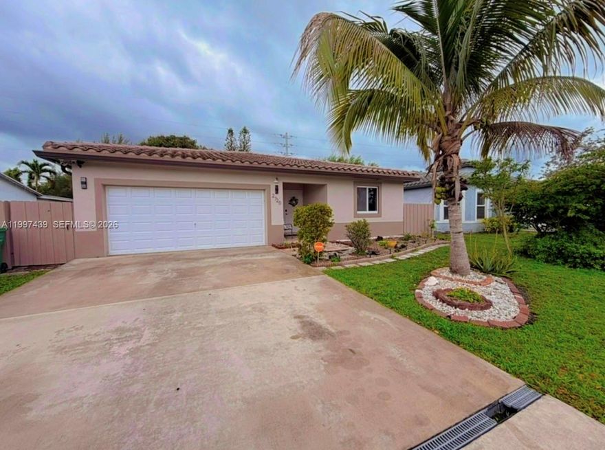 Beautiful 4-bedroom, 2-bathroom single-family home with a 2-car garage located in the Washington Park area of Fort Lauderdale. Built just in 2014 , this home features elegant porcelain and wood  flooring throughout, a stunning kitchen with granite countertops, and a new washer and dryer. Enjoy peace of mind with all impact windows. Freshly painted and move-in ready. Conveniently situated near I-95 and major shopping centers. Thank you for showing!